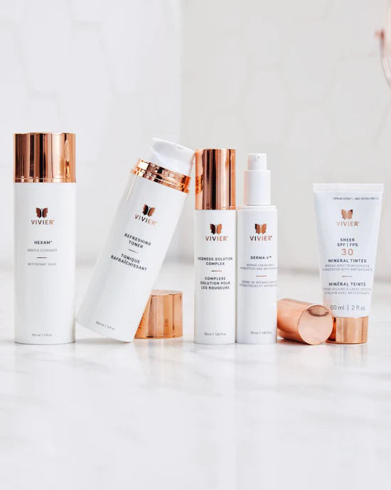 Vivier Sensitive Skin Program products displayed together, including cleanser, toner, targeted treatment, moisturizer, and mineral sunscreen