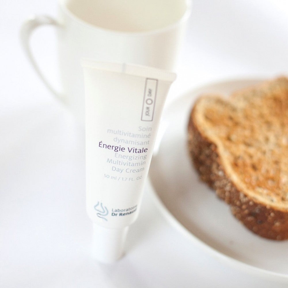 Laboratoire Dr Renaud Energie Vitale multivitamin day cream displayed beside a cup and toast on a breakfast table