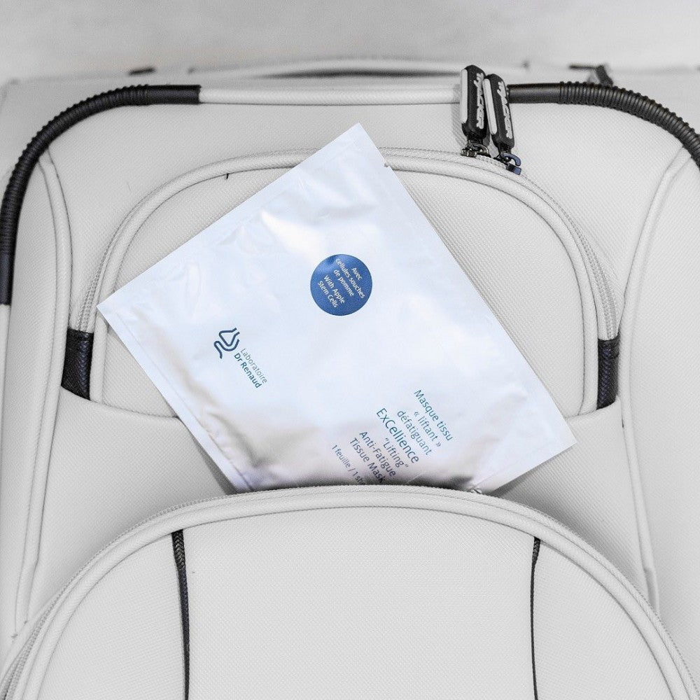 Laboratoire Dr Renaud ExCellience Lifting Anti-Fatigue Tissue Mask lifestyle presentation in white cosmetic bag
