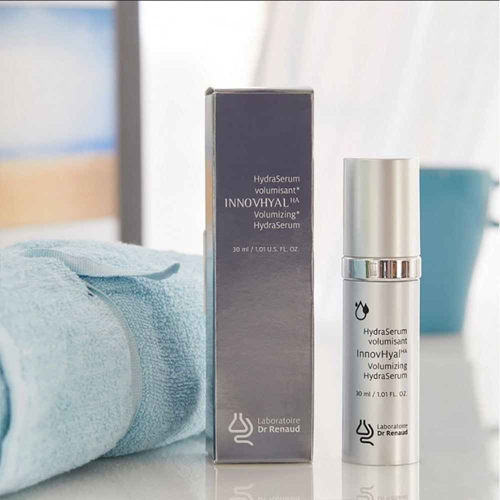 INNOVHYAL HA Volumizing HydraSerum by Laboratoire Dr Renaud, skincare serum bottle displayed in a natural setting