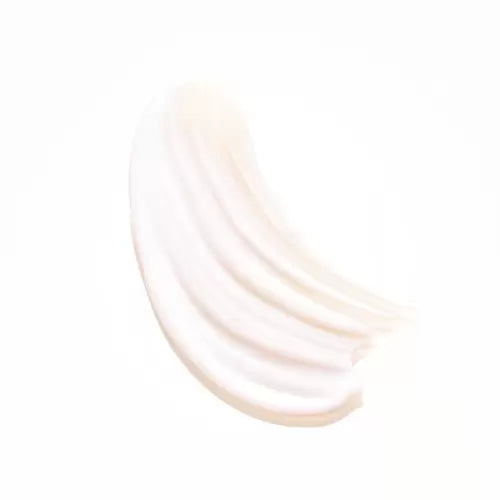 Silky cream texture swipe on white background