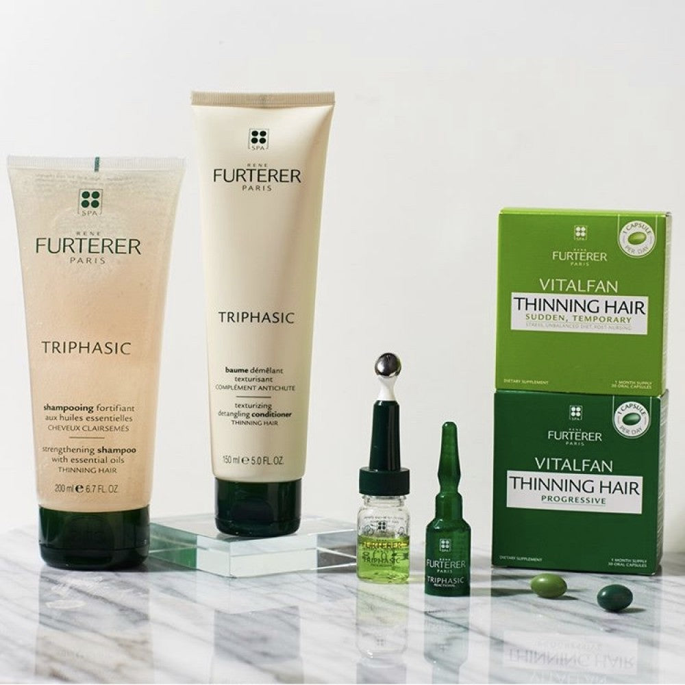 Rene Furterer Triphasic anti hair loss range with shampoo, conditioner, vials and supplements