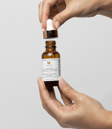 Vivier Advanced Skin Lightening Serum dropper dispensing serum, illustrating lightweight texture