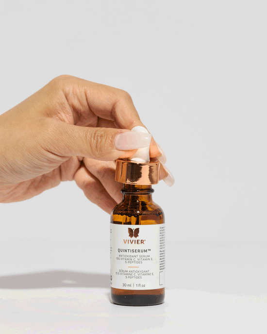Vivier QuintiSerum dropper dispensing serum, illustrating lightweight texture