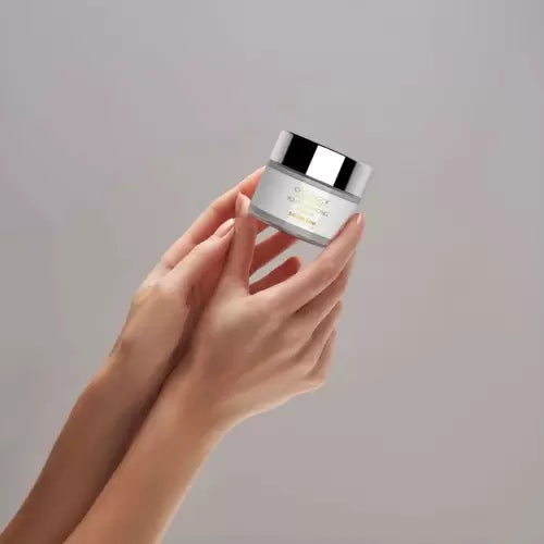 Swissline Youth-Inducing Cream 50ml jar held in hands